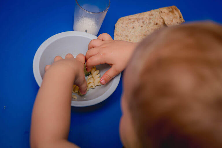 alt='infant self feeding pasta salad'